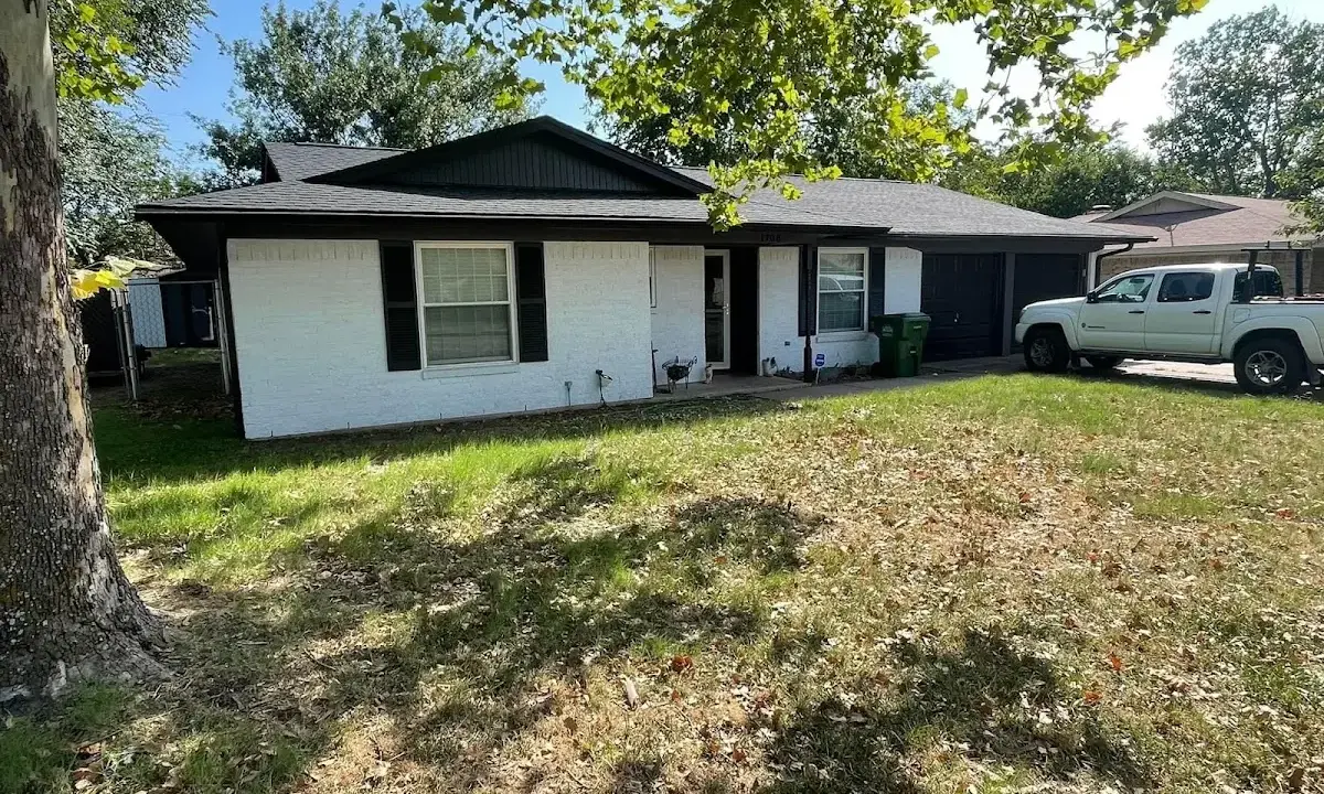 Professional roofing crew working on a residential roof in Point Pleasant Beach